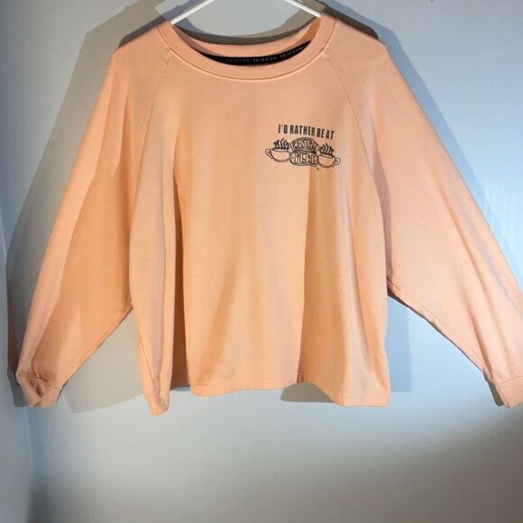 Friends Cropped Dolman Sleeve Central Perk Sweatshirt. Peach, Medium - Picture 1 of 9